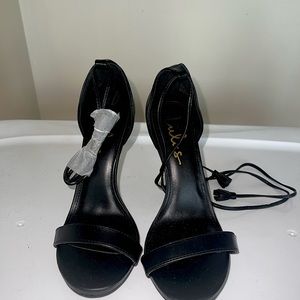 brand new black Lulu heels